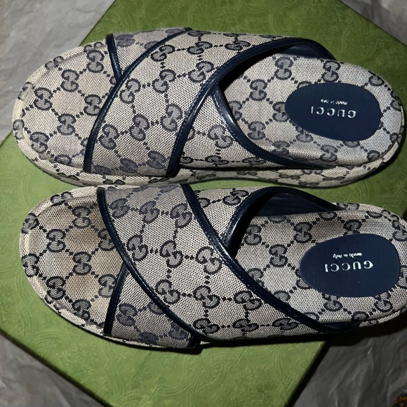 Gucci Shoes - Women's GG platform slide sandal
